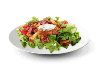 Salade, tomates, ch�vre chaud, lardons, cro�tons de pain 
+ Sauce vinaigrette  
+ Pain offert.